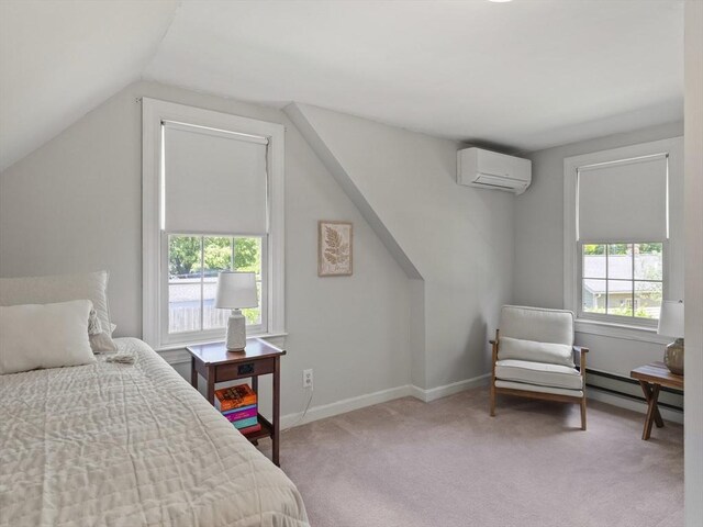 34 Kinsley Rd, Acton, MA 01720 - carpeted bedroom with a wall unit AC, lofted ceiling, a baseboard heating unit, and baseboards