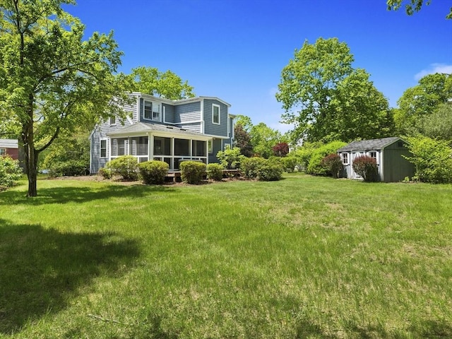 34 Kinsley Rd, Acton, MA 01720 - view of green lawn featuring a sunroom