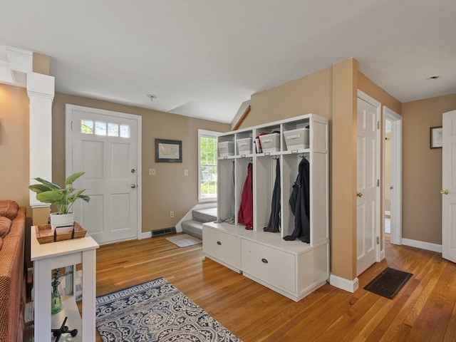 34 Kinsley Rd, Acton, MA 01720 - mudroom featuring light wood-type flooring and baseboards