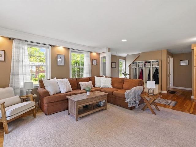 34 Kinsley Rd, Acton, MA 01720 - living room featuring light wood finished floors, ornamental molding, baseboards, and recessed lighting