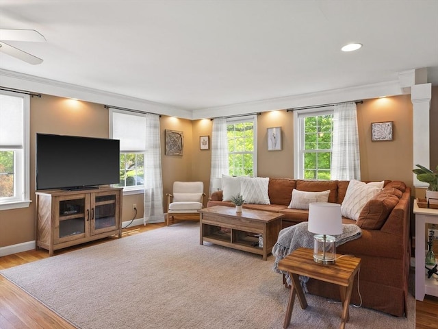34 Kinsley Rd, Acton, MA 01720 - living room with crown molding, plenty of natural light, wood finished floors, and recessed lighting