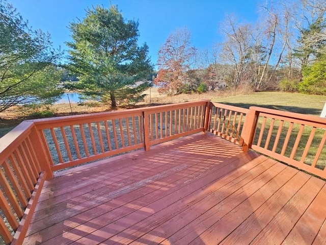 deck featuring a lawn