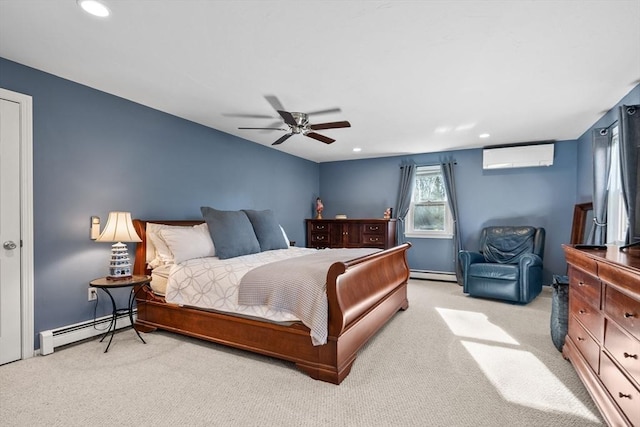 bedroom with a wall mounted air conditioner, ceiling fan, light colored carpet, and a baseboard heating unit