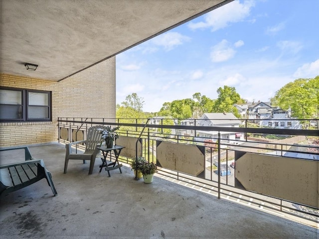 balcony featuring a residential view
