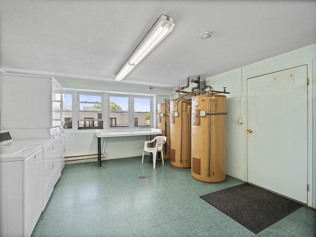 interior space with stacked washer / dryer, water heater, washer and dryer, and a baseboard heating unit