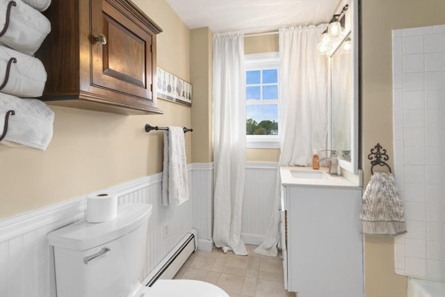 121 Lynnfield St, Lynn, MA 01904 - full bathroom featuring a baseboard heating unit, a wainscoted wall, toilet, and vanity
