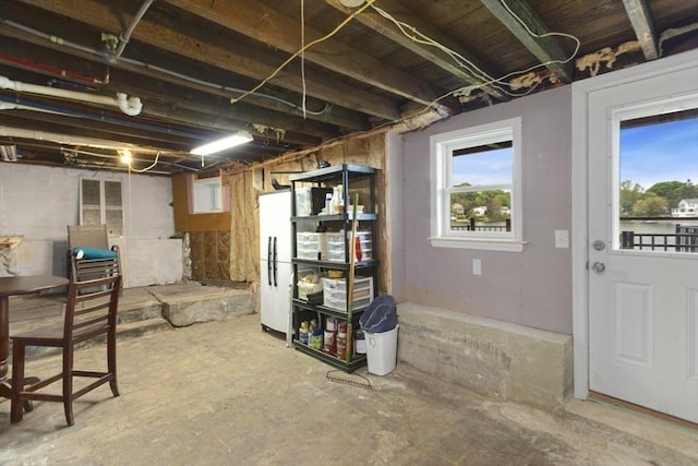 121 Lynnfield St, Lynn, MA 01904 - below grade area with freestanding refrigerator
