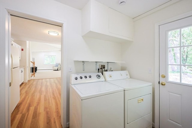 13 Dixon Cir, Holliston, MA 01746 - washroom with plenty of natural light, light wood finished floors, and washing machine and dryer