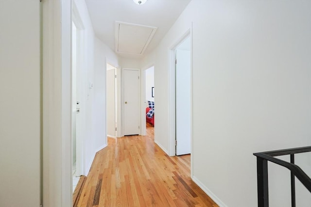 13 Dixon Cir, Holliston, MA 01746 - corridor with attic access, light wood-style floors, and baseboards