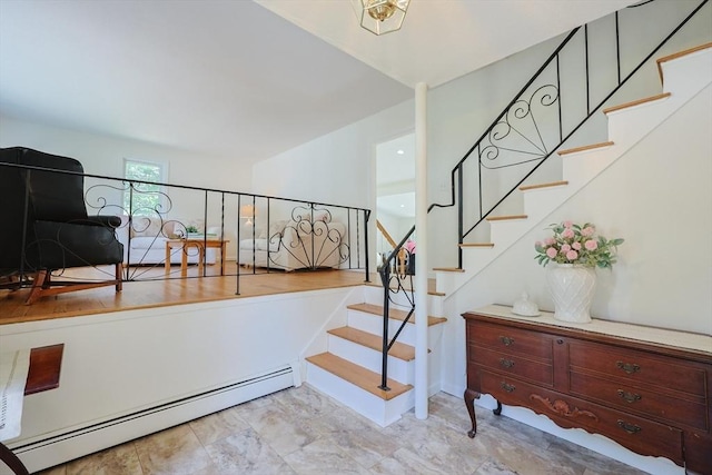 13 Dixon Cir, Holliston, MA 01746 - stairway with a baseboard heating unit and marble look tile flooring
