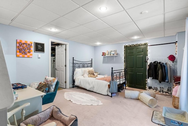 carpeted bedroom featuring a closet