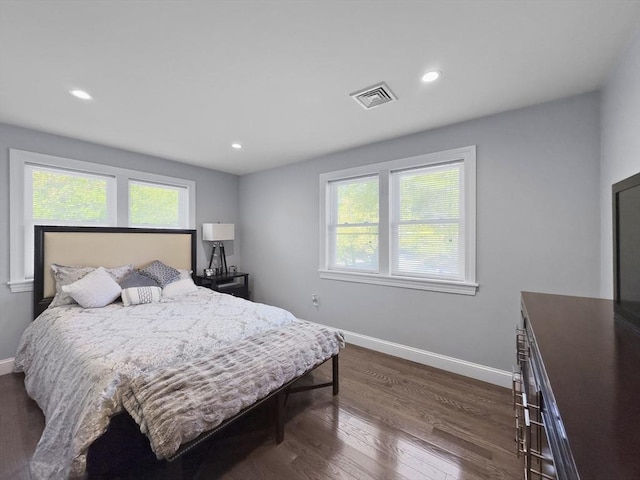 851 Forest St, North Andover, MA 01845 - bedroom featuring multiple windows, baseboards, dark wood-type flooring, and recessed lighting