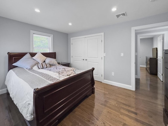851 Forest St, North Andover, MA 01845 - bedroom featuring baseboards, a closet, wood finished floors, and recessed lighting