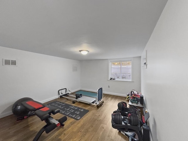 851 Forest St, North Andover, MA 01845 - workout room with wood finished floors and baseboards