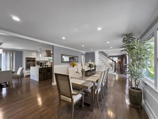 851 Forest St, North Andover, MA 01845 - dining room featuring stairway, healthy amount of natural light, ornamental molding, dark wood-style flooring, and recessed lighting