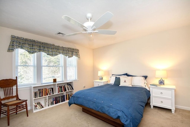 carpeted bedroom featuring ceiling fan