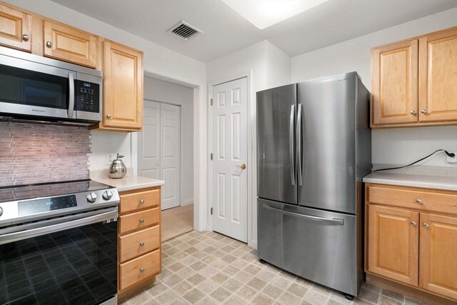 kitchen with appliances with stainless steel finishes