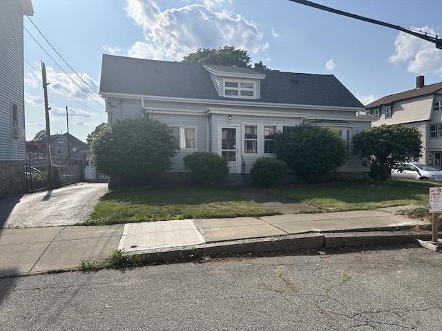 121 Kellogg St, Fall River, MA 02721 - view of front of house with concrete driveway