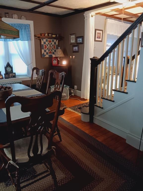 121 Kellogg St, Fall River, MA 02721 - dining space with wood finished floors and stairs