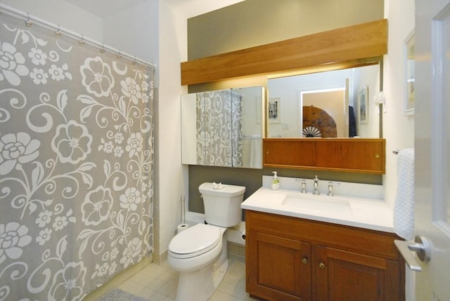 full bathroom with toilet, a shower with curtain, tile patterned flooring, and vanity
