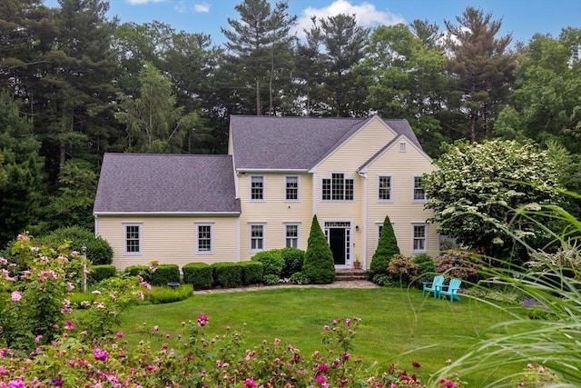 7 Lauras Ln, Marshfield, MA 02050 - colonial home featuring a front lawn and a shingled roof