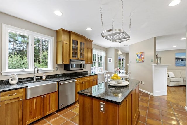 7 Lauras Ln, Marshfield, MA 02050 - kitchen featuring appliances with stainless steel finishes, a sink, recessed lighting, brown cabinets, and glass insert cabinets