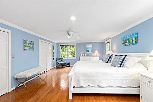 7 Lauras Ln, Marshfield, MA 02050 - bedroom with ornamental molding, multiple windows, wood finished floors, a closet, and ceiling fan