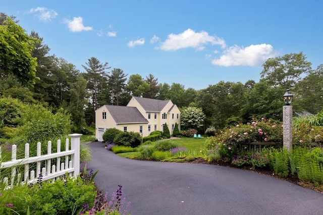 7 Lauras Ln, Marshfield, MA 02050 - view of asphalt driveway with street lighting and view of wooded area