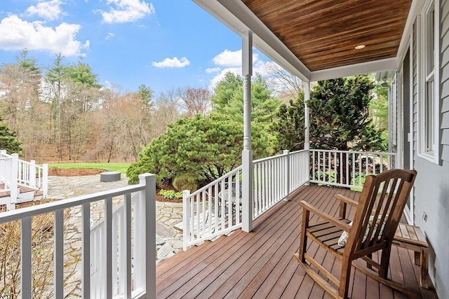 deck with covered porch
