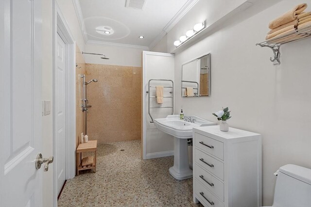 full bathroom with visible vents, ornamental molding, toilet, a walk in shower, and speckled floor