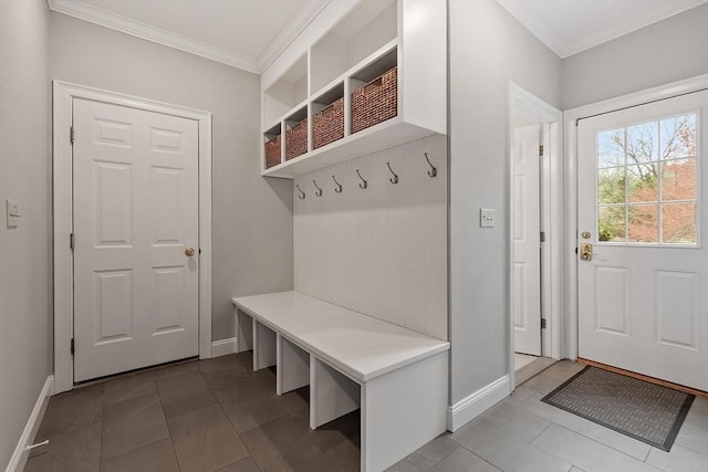 mudroom with crown molding and baseboards