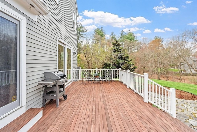 deck featuring a grill