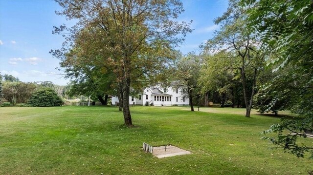 view of front of home with a front lawn