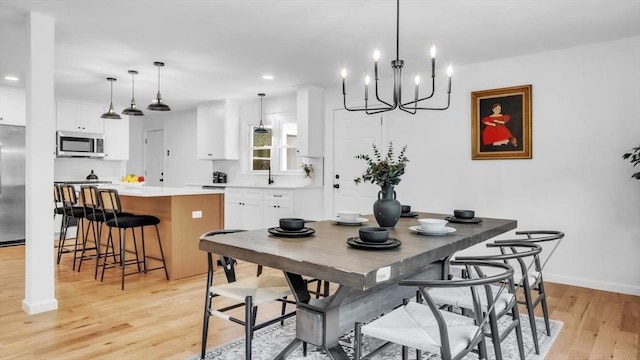 90 Fox Farms Rd, Northampton, MA 01062 - dining room featuring light wood-type flooring, baseboards, recessed lighting, and a chandelier