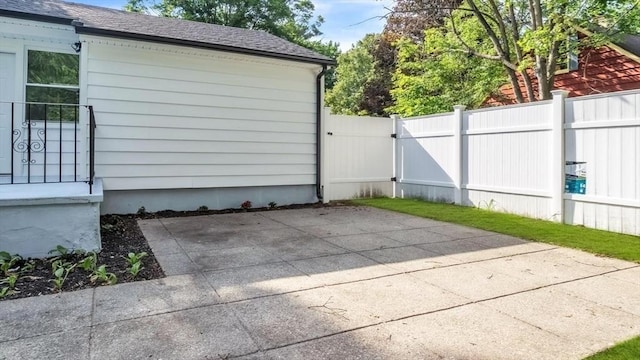 90 Fox Farms Rd, Northampton, MA 01062 - exterior space with a patio area and roof with shingles