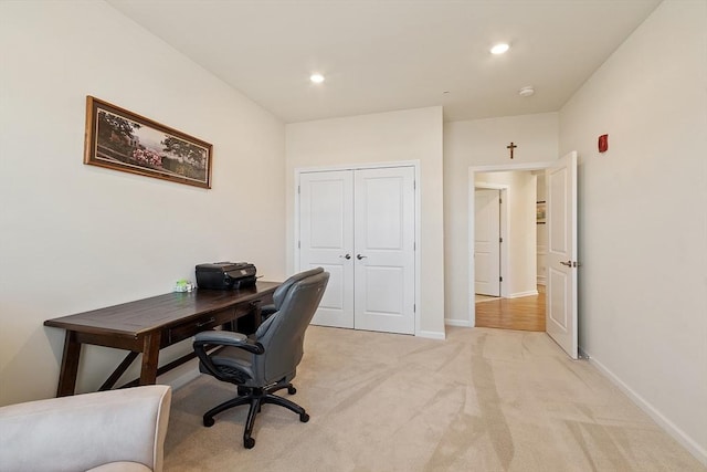 home office featuring light carpet, baseboards, and recessed lighting