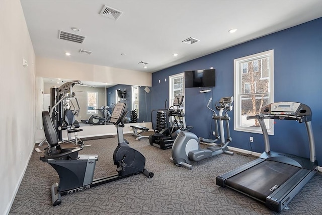 gym with visible vents and baseboards