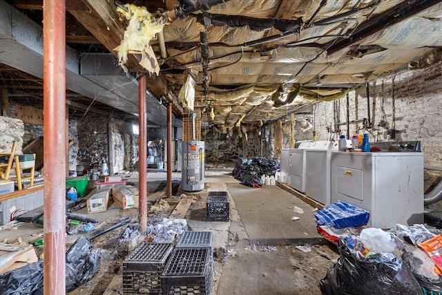 basement with independent washer and dryer and water heater