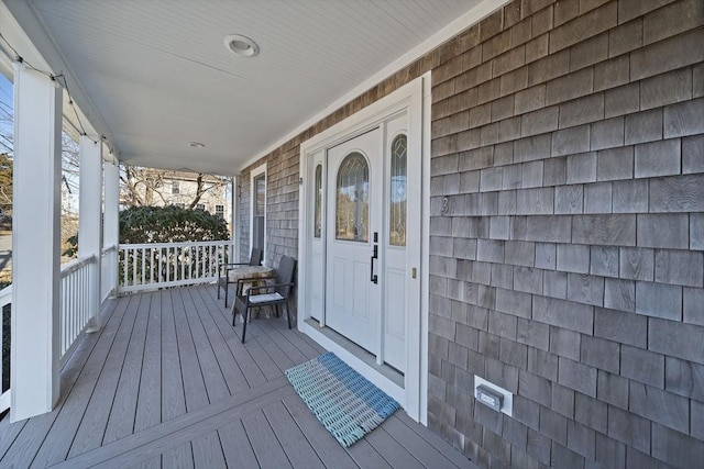 wooden terrace featuring a porch