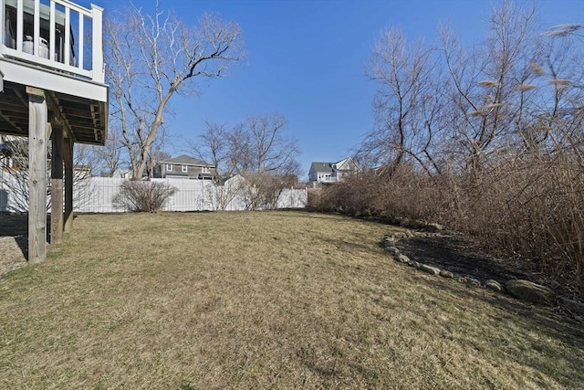 view of yard featuring fence