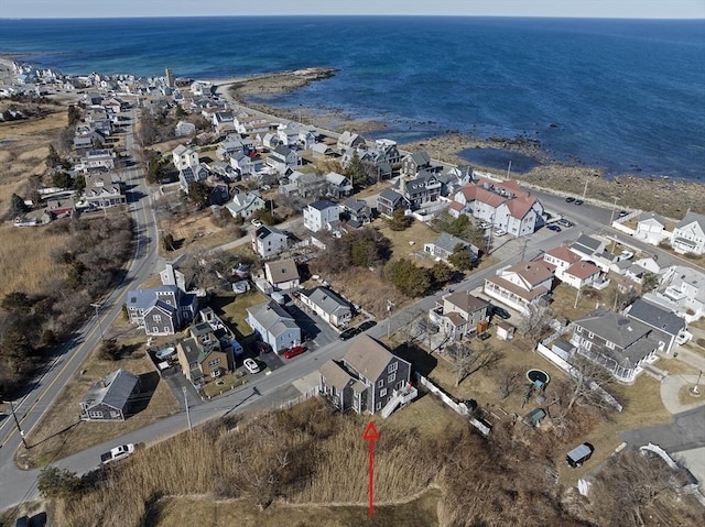 bird's eye view featuring a residential view and a water view