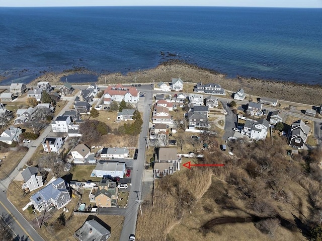 birds eye view of property featuring a residential view and a water view