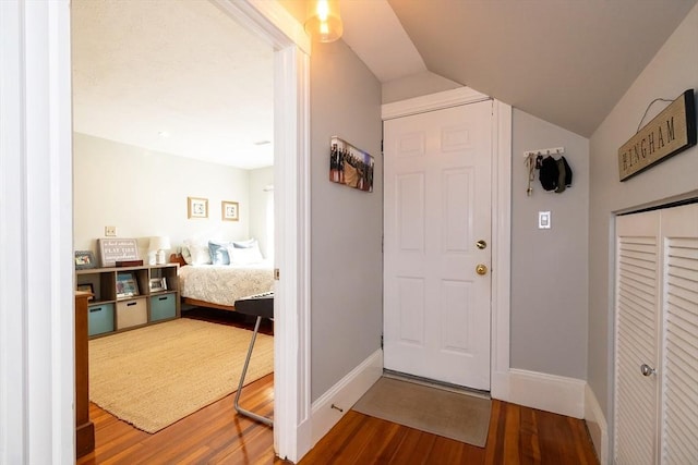 345 Ashmont St Unit 3, Boston, MA 02124 - entryway with baseboards, vaulted ceiling, and wood finished floors