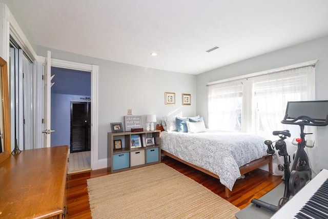 345 Ashmont St Unit 3, Boston, MA 02124 - bedroom featuring visible vents, wood finished floors, baseboards, and recessed lighting