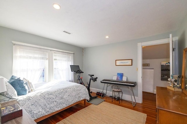 345 Ashmont St Unit 3, Boston, MA 02124 - bedroom featuring baseboards, recessed lighting, visible vents, and wood finished floors