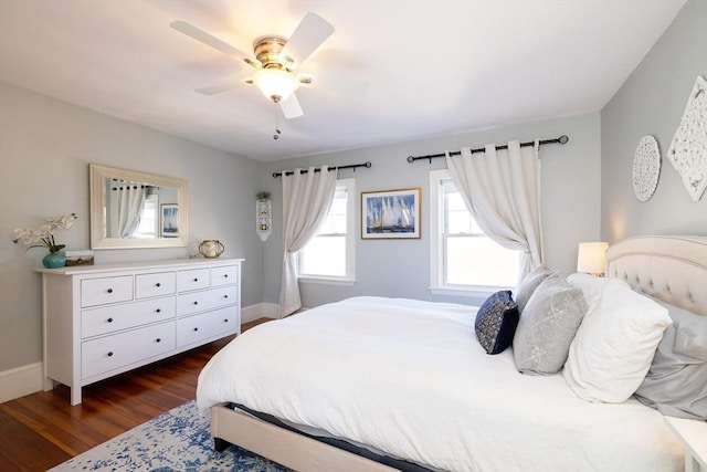 345 Ashmont St Unit 3, Boston, MA 02124 - bedroom with dark wood finished floors, baseboards, and a ceiling fan