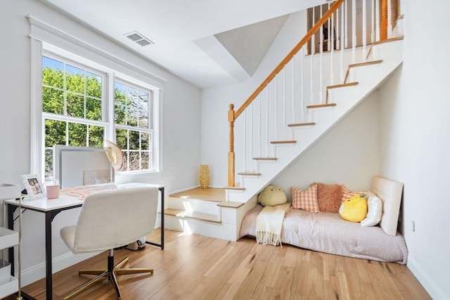 office area featuring wood finished floors and baseboards
