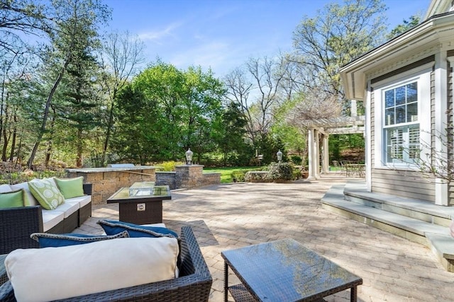 view of patio with an outdoor hangout area and a pergola