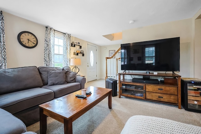 living room featuring light colored carpet