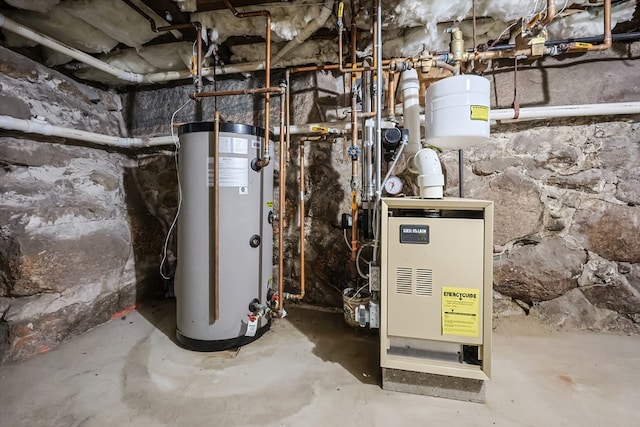 utility room featuring water heater